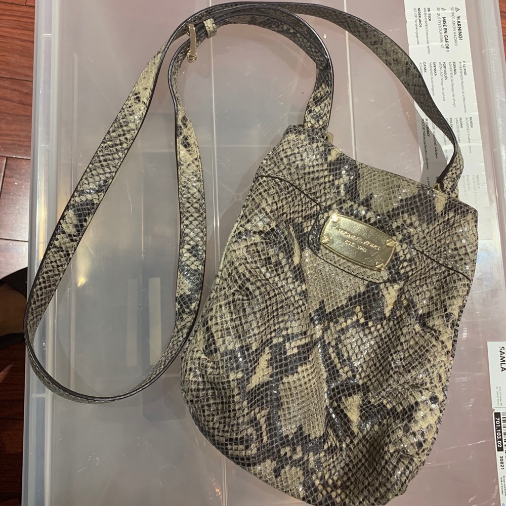 Women’s snakeskin crossbody bag